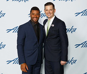 Our client Children's Hospital's new CEO Jeff Sperring with Russell Wilson